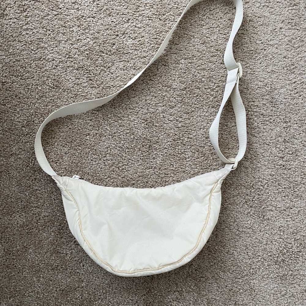 UNIQLO Cream Crescent Crossbody Bag with Adjustable Strap